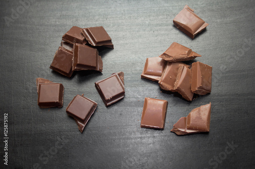 slices of chocolate on a black background