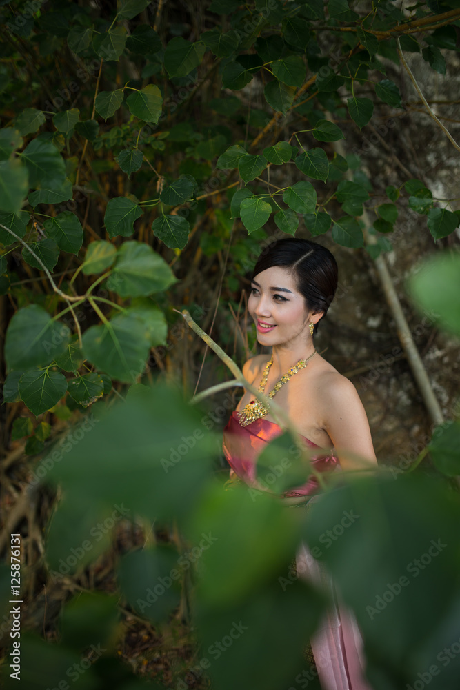 Asian woman wearing dress traditional Thai costume ,beautiful wo Asian woman wearing dress traditional Thai costume ,beautiful wo