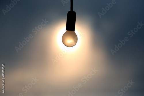 the silhouette of the electric bulb on the background of the set