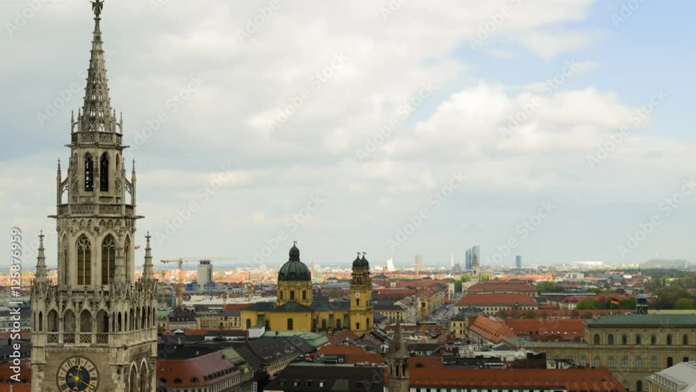 Timelapse with panoramic view of Munich city center showing the City Hall and the Frauenkirche, Germany Timelapse with panoramic view of Munich city center showing the City Hall and the Frauenkirche, Germany