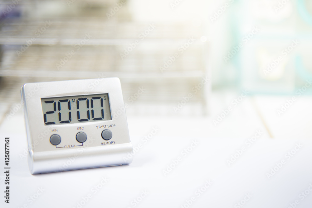 Timer count down laboratory equipment in over white tone. Timer count down laboratory equipment in over white tone.
