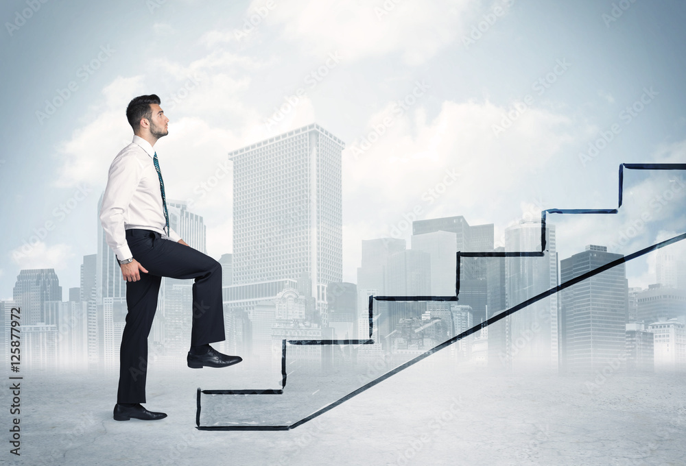 Business person in front of a staircase Business person in front of a staircase