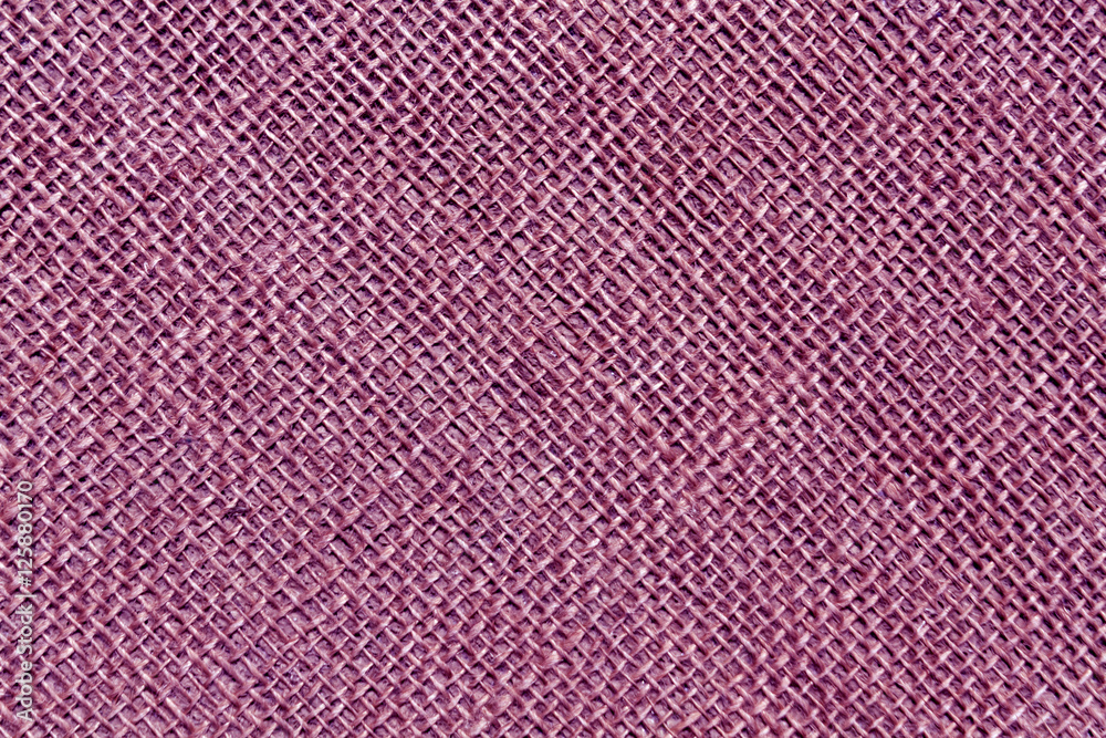 Magenta toned hessian sack cloth texture. Magenta toned hessian sack cloth texture.