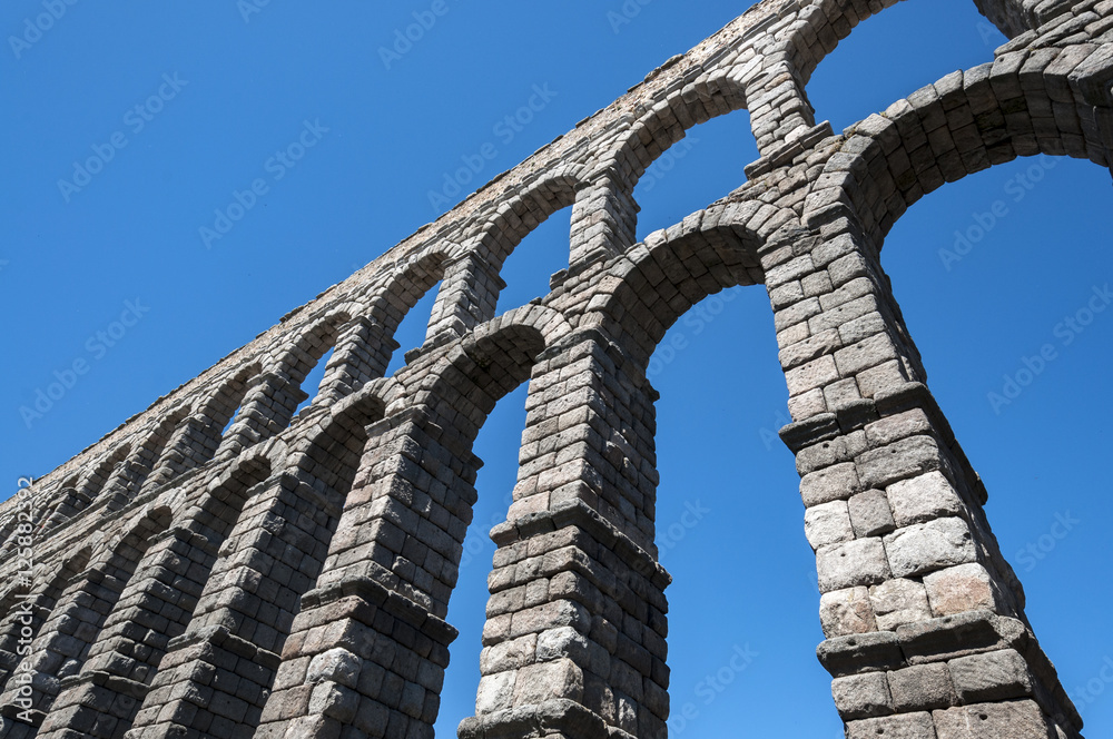 Views of the Aqueduct of Segovia, Spain. It is a roman aqueduct and the date of construction cannot be definitively determined