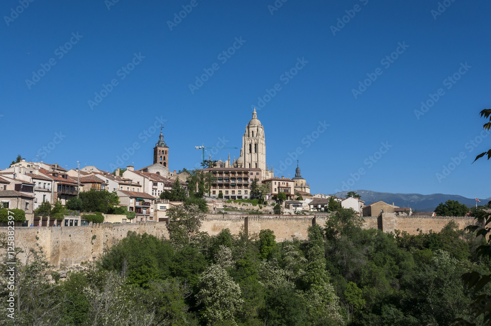 Views of the city of Segovia, Spain, from the city wall, with the Cathedral and the Church of Saint Andrew in the background.