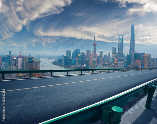 Empty road floor with bird-eye view at Shanghai bund Skyline