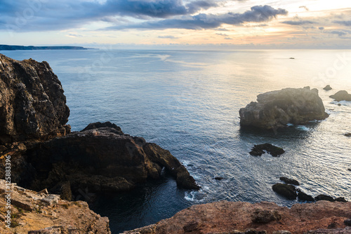 Atlantic ocean rocky coastline near Arrifana. Vicentina Coast Natural Park. Algarve region. Portugal