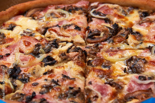 Pizza with Barbecue Chicken./Pizza with Barbecue Chicken, Sausage, Bacon, Onions and Mushroom.