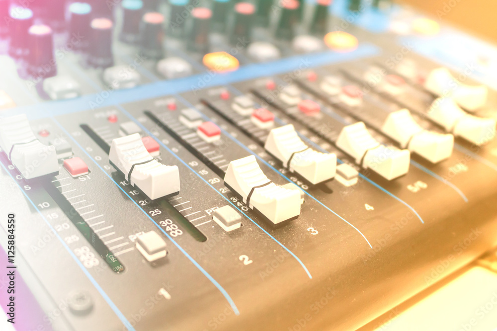 Mixer in recording room. Making light soft Mixer in recording room. Making light soft