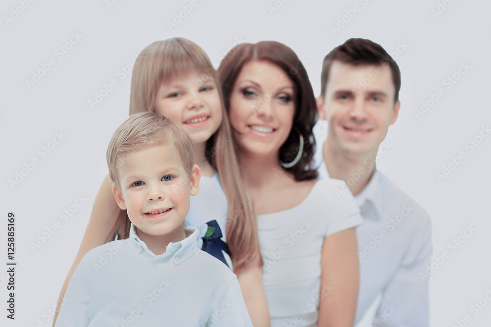 the image of a happy family with smiling son in the foreground the image of a happy family with smiling son in the foreground