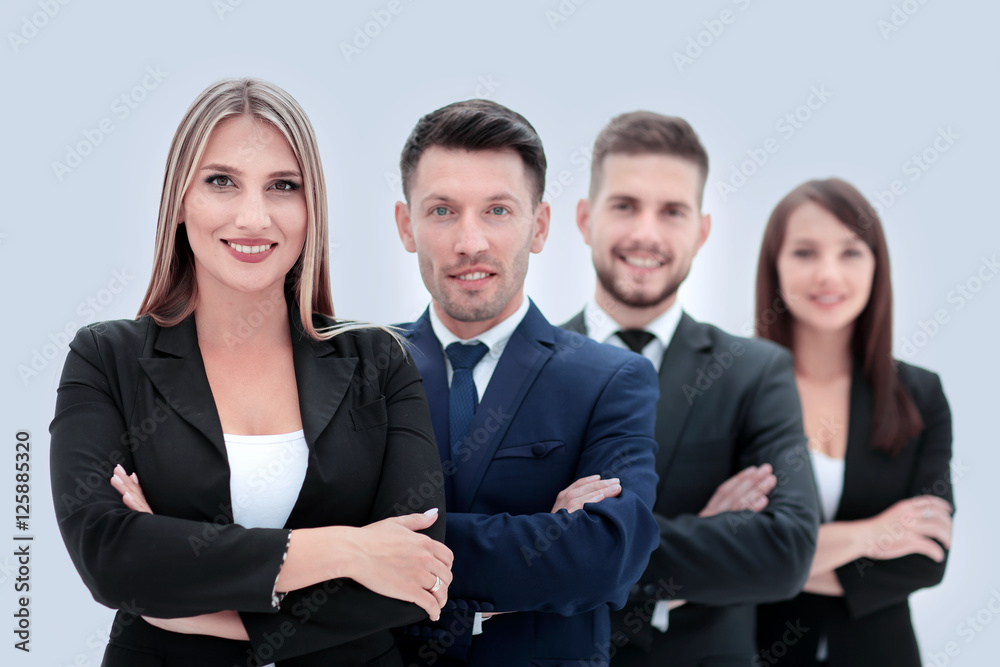 Team of successful and confident people posing on a white backgr Team of successful and confident people posing on a white backgr