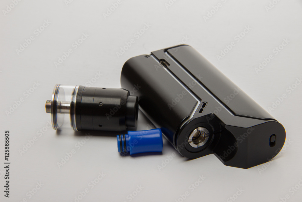 Dismantled parts of the electronic cigarette black and steel col Dismantled parts of the electronic cigarette black and steel col