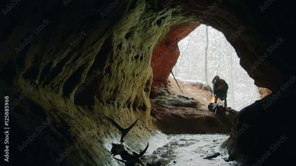 Stone age man in cave