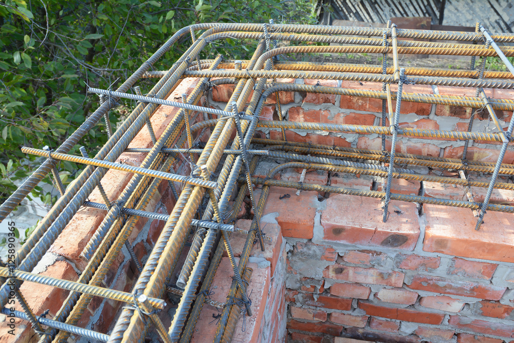 Corner. Rebar steel bars, reinforcement concrete bars with wire rod. Brickwork with Iron Bars