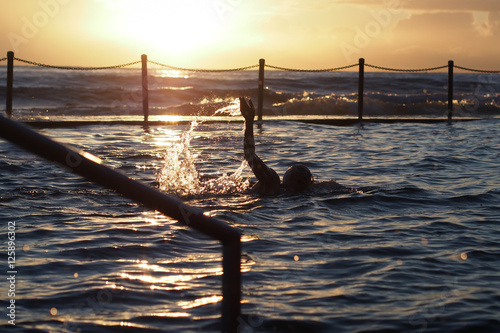 ocean pool swimming at sunrise