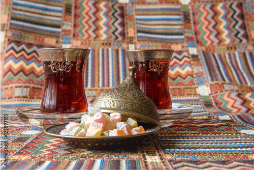 Photography Traditional Turkish tea on the colored tablecloth