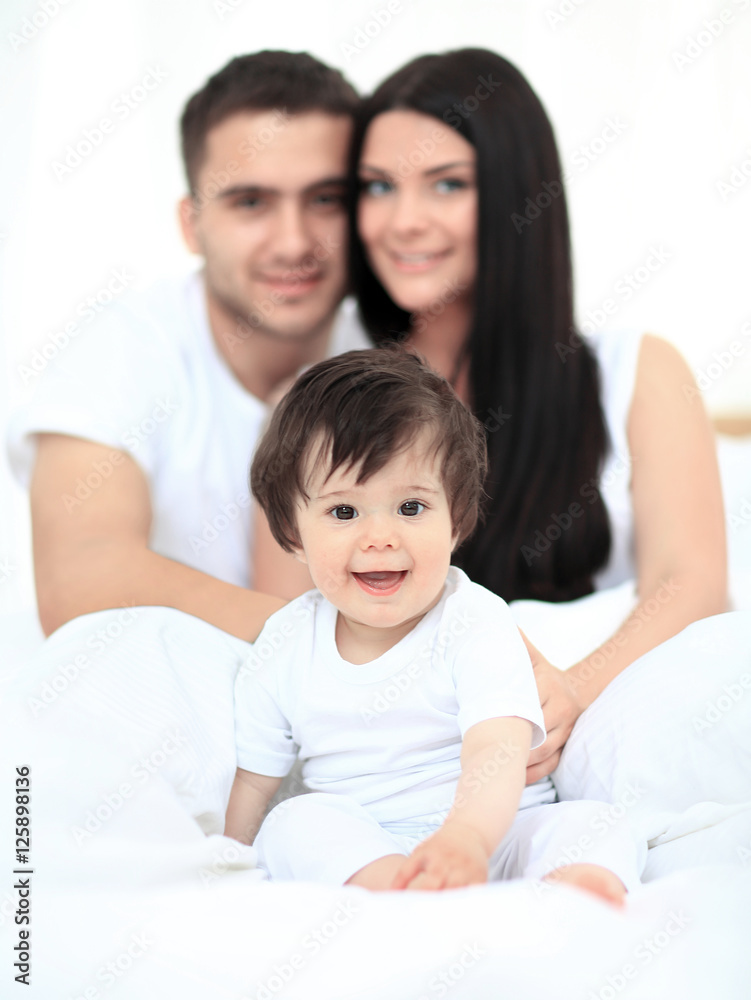 family with young children to bed in the bedroom