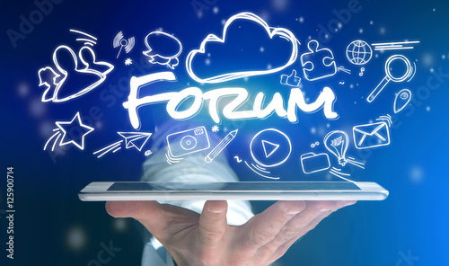 Concept of man holding tablet with forum icon around