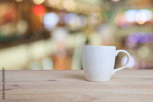 a cup of coffee and blurred bokeh background