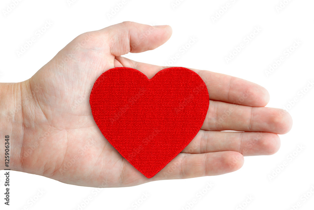 Red heart symbol in hand isolated on white background