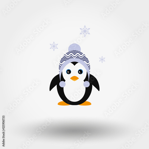 Penguin in a knitted cap. © Afone4ka