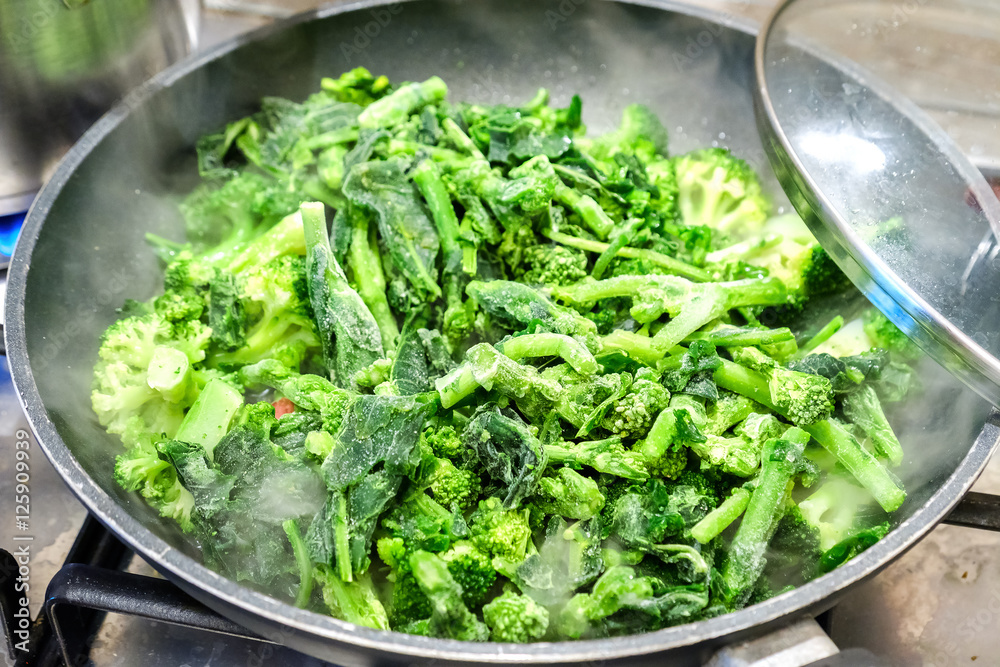 frozen broccoli turnip green cooking vegetable pan frozen broccoli turnip green cooking vegetable pan