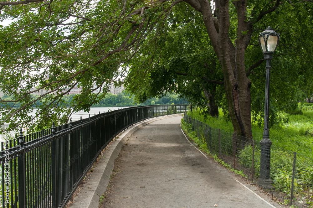 Jogging track around lake in Central Park, New York