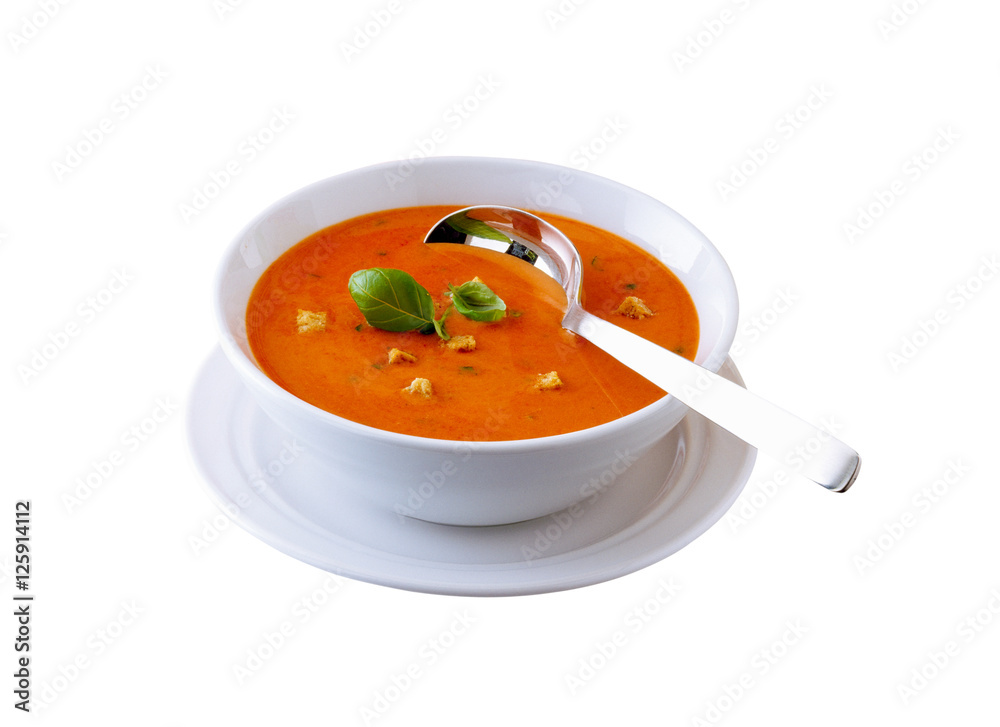 Tomato soup in a bowl. Isolated on white Tomato soup in a bowl. Isolated on white