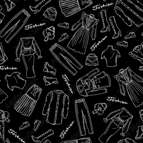 Pattern with hand drawn isolated fashionable clothes for women on black color. Pattern on the theme of fashion