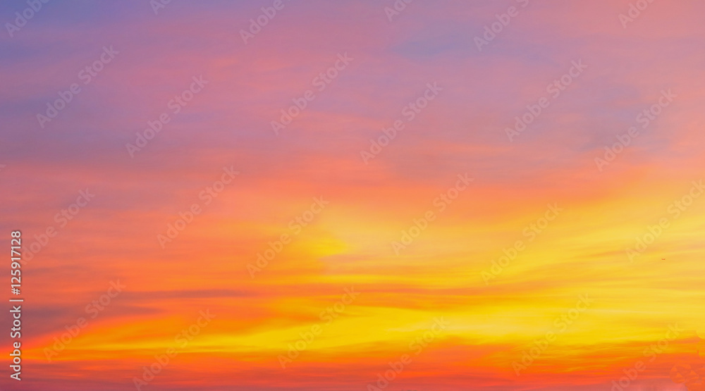 Bright orange and yellow colors dramatic sunset sky,sunrise sky,soft focus
