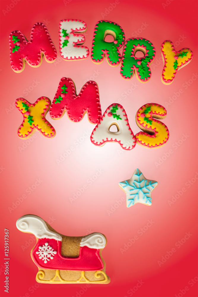 Merry Christmas gingerbread cookies. Handmade cookies with beautiful letters and symbols