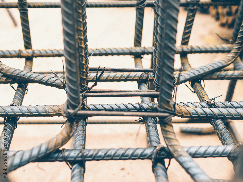 Vintage style photo of selective focused steel rods in reinforced ...