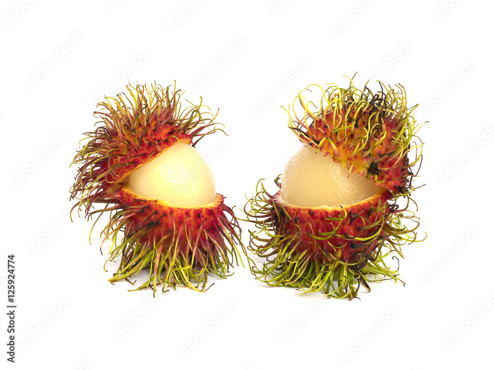 Twin partial peeled rambutans isolated over white Twin partial peeled rambutans isolated over white