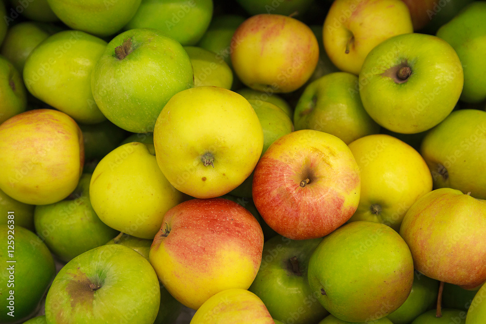 Pile of colorful ripe apples closeup. Food Pile of colorful ripe apples closeup. Food