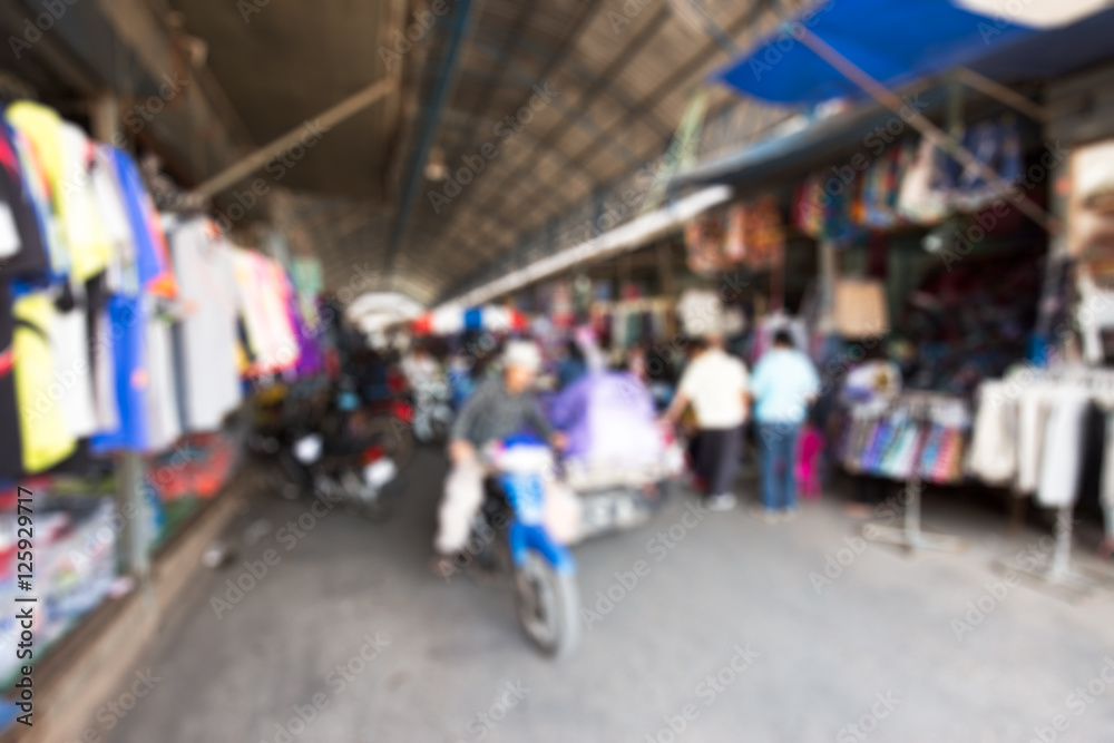 Blurred photo of clothes Shopping center and people background