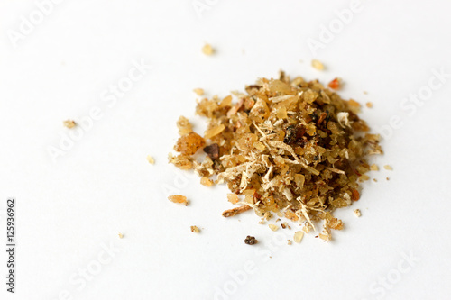 Close-up of natural aromatic incense musk isolated on a white backgroundon Arab environment photo
