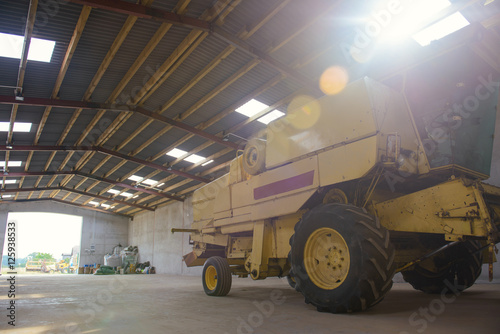 combine harvester in the garage