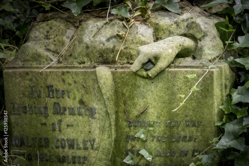 Broken Stone Hand on Gravestone, Abney Park, London photo