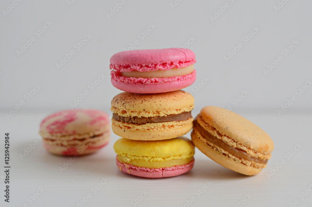 French colorful macarons with white background French colorful macarons with white background