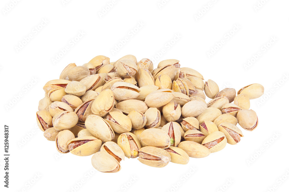 delicious pistachio nuts on  plate on  white background