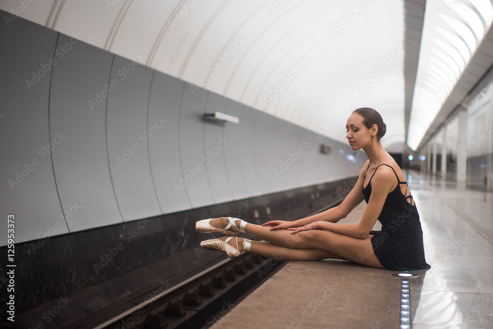 Fototapeta premium Ballerina in Moscow Metro wearing pointe shoes