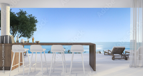 3d rendering dining bar in small villa near beautiful beach and sea at noon with blue sky © dit26978