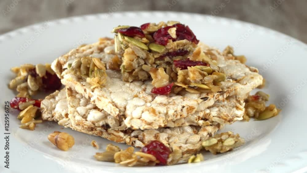 Multi-grain toast with seeds and raisins rotating on a plate. Seamless loopable. Prores 4k Multi-grain toast with seeds and raisins rotating on a plate. Seamless loopable. Prores 4k