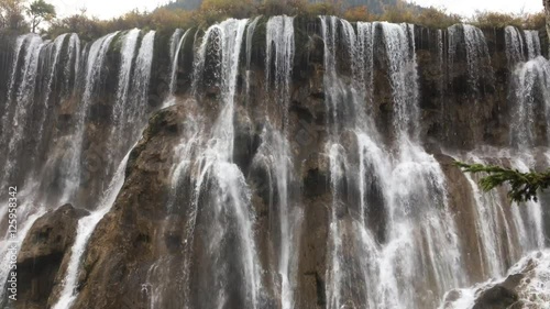 Grand  Great waterfalls at Jiuzhaigou National Park  where is the UNESCO World Heritage in Sichuan , China in  Autumn in November located in  in  Tibetan-Qiang of Sichuan ,China