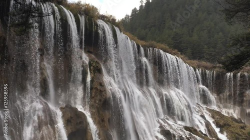 Grand  Great waterfalls at Jiuzhaigou National Park  where is the UNESCO World Heritage in Sichuan , China in  Autumn in November located in  in  Tibetan-Qiang of Sichuan ,China
