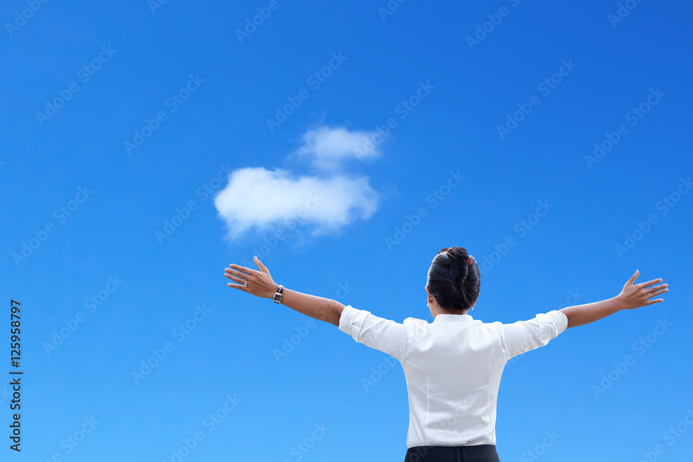 woman with her arms raised on natural background woman with her arms raised on natural background
