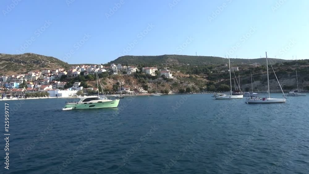 Yachts anchored at the port of Pythagorio in Samos island. Yachts anchored at the port of Pythagorio in Samos island.