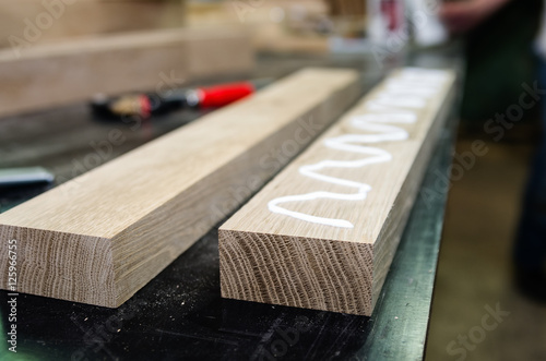 Preparing wooden surfaces for bonding. Joiner's shop
