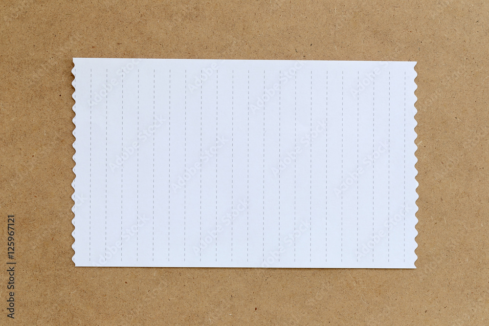 Fototapeta premium vintage of cardboard on brown background and copy specs.