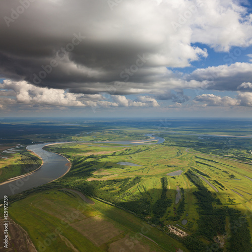 Landscape with river and clouds